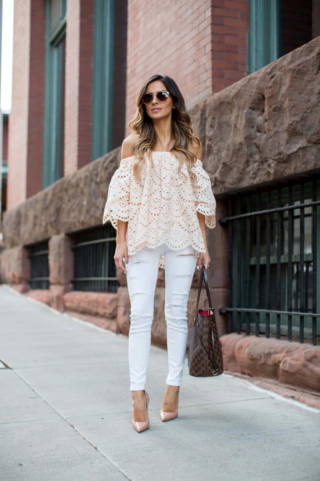 fashion blogger maria vizuete wearing a lace off-the-shoulder top from shopbop