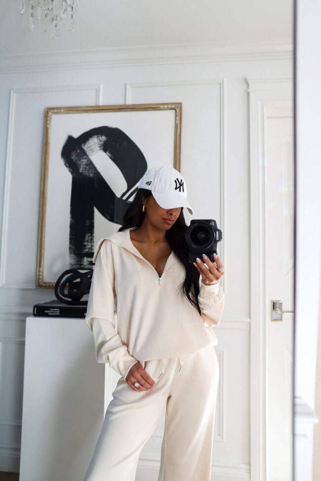 fashion blogger mia mia mine wearing a white matching lounge set from walmart