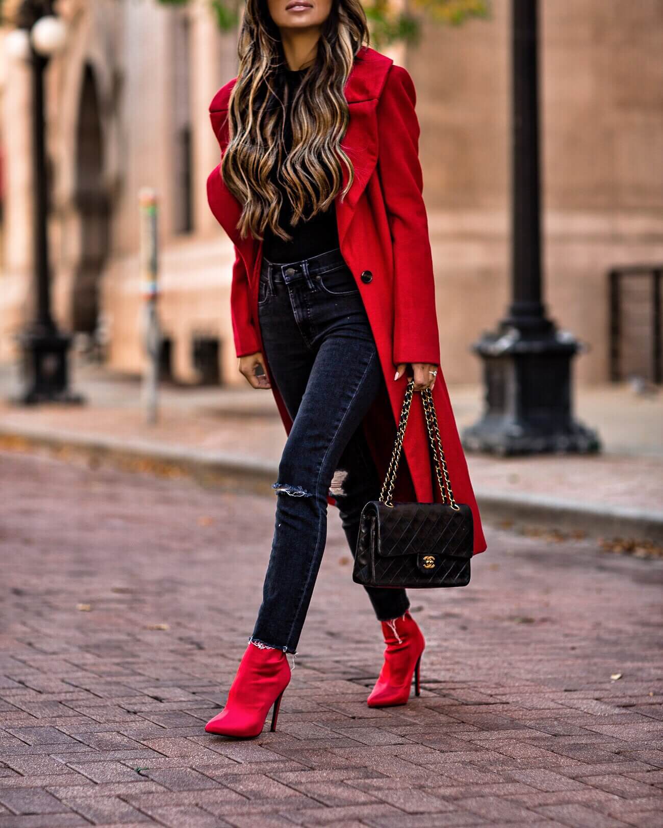 mia mia mine wearing red statement booties from steve madden