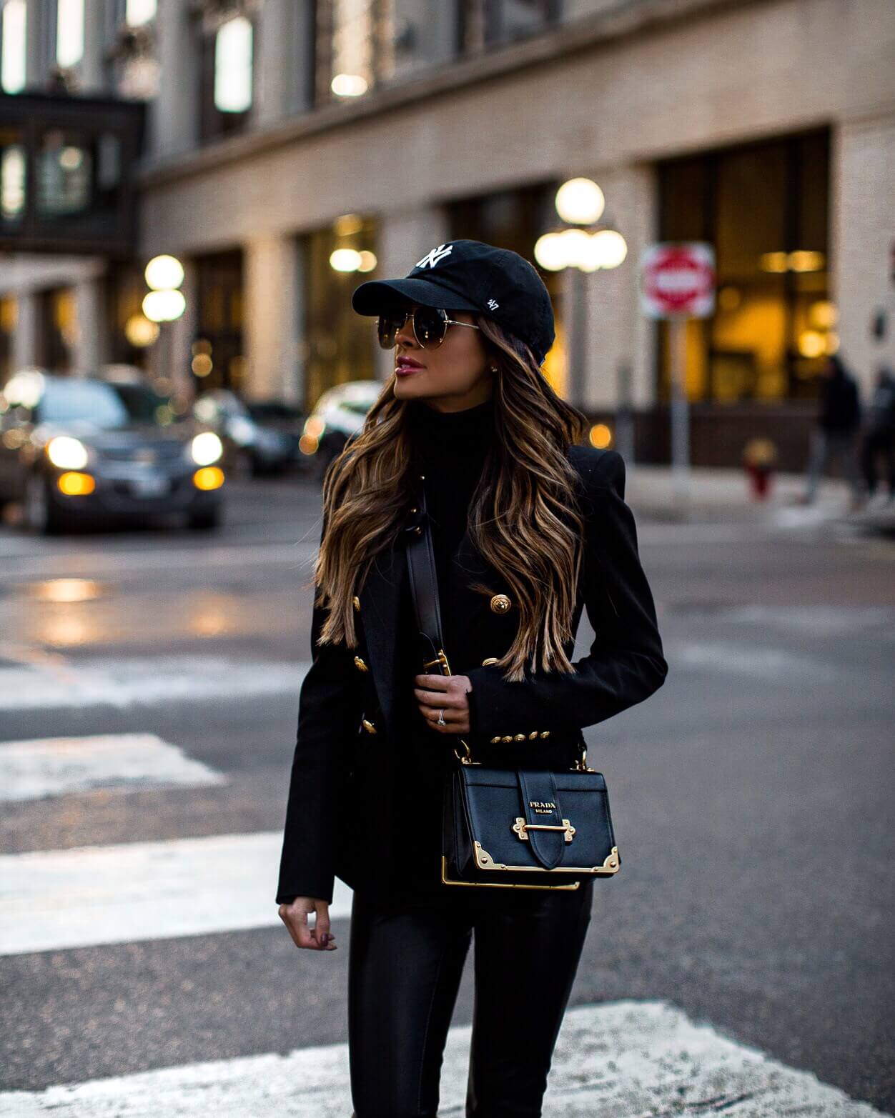 Blogger MiaMiaMine wearing Balmain Blazer, Blank Denim Leather Pants, and  baseball cap for spring at MiaMiaM…