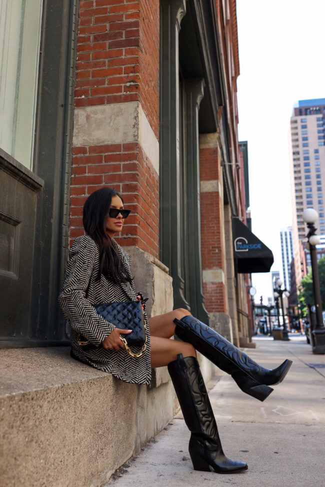 Wearing cozy knits and Louis Vuitton Boots. Check out