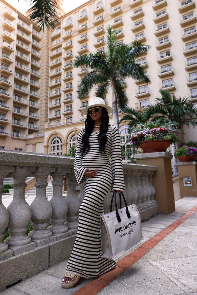 fashion blogger wearing a stripe knit dress from shopbop