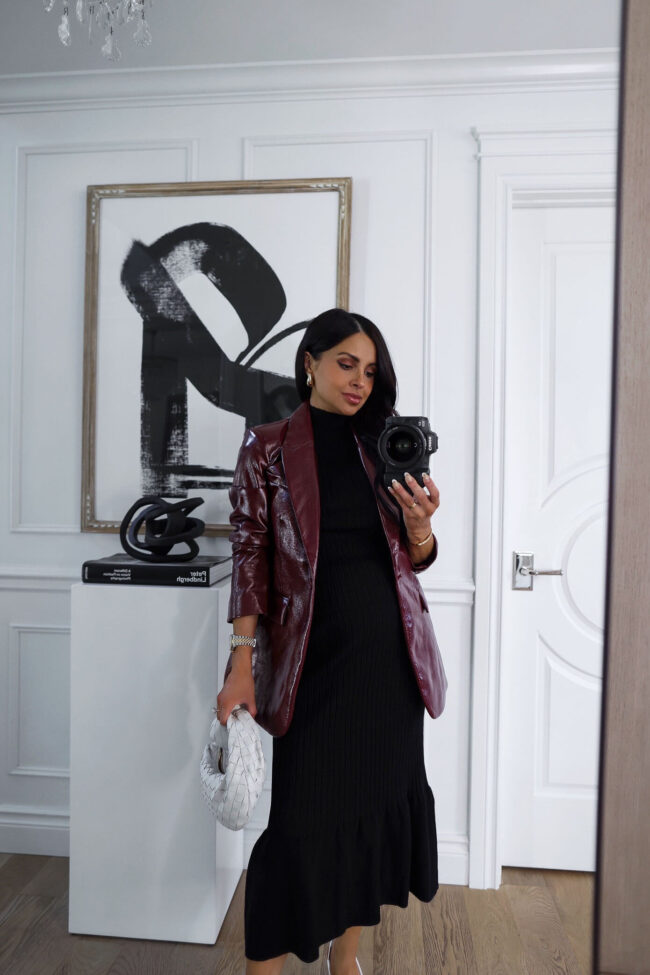 fashion blogger wearing a burgundy faux leather blazer 