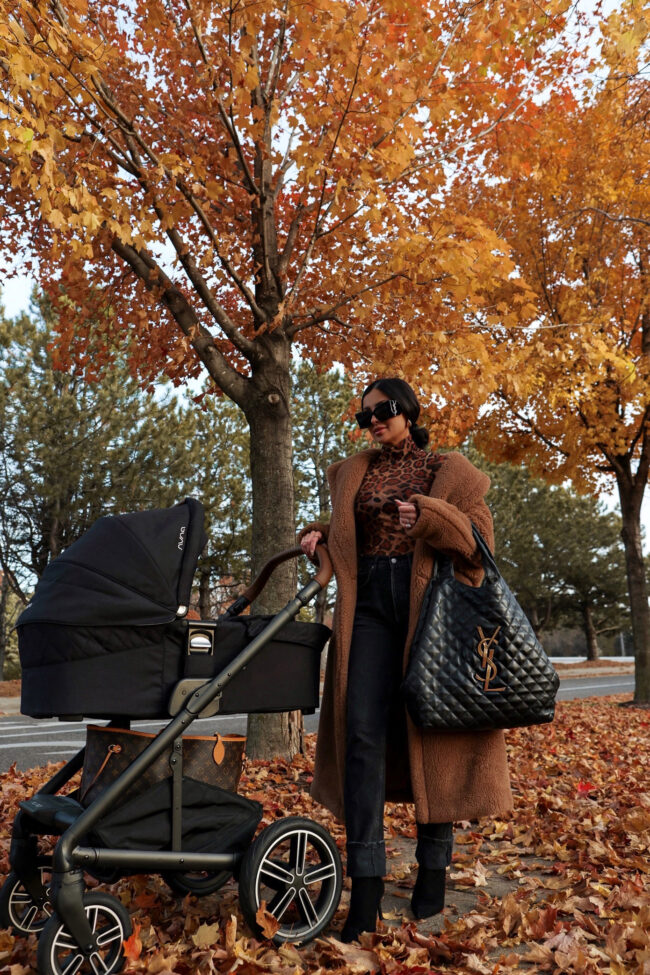 brunette fashion blogger wearing a black and leopard outfit for fall